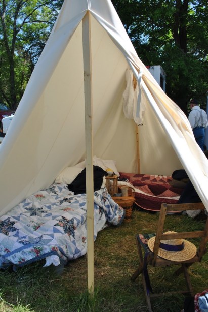 2 cots, 3 girls. Guess who got the ground? :)