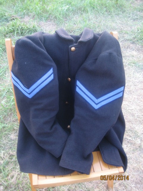 Two of our guys were promoted to corporal, so I had to sew on some "chevrons" 